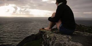 Solo walker on Irish coastal path