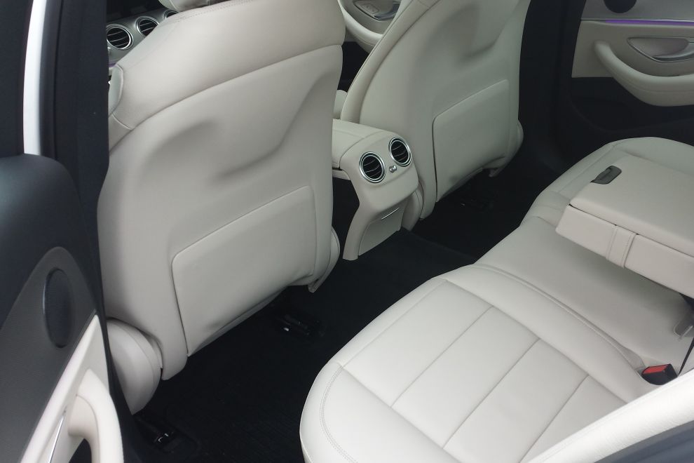 The interior of a white two seater Mercedes E Class luxury saloon car for private tours of Ireland.
