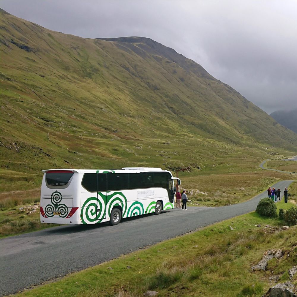 Private tour bus for ireland in the mountains
