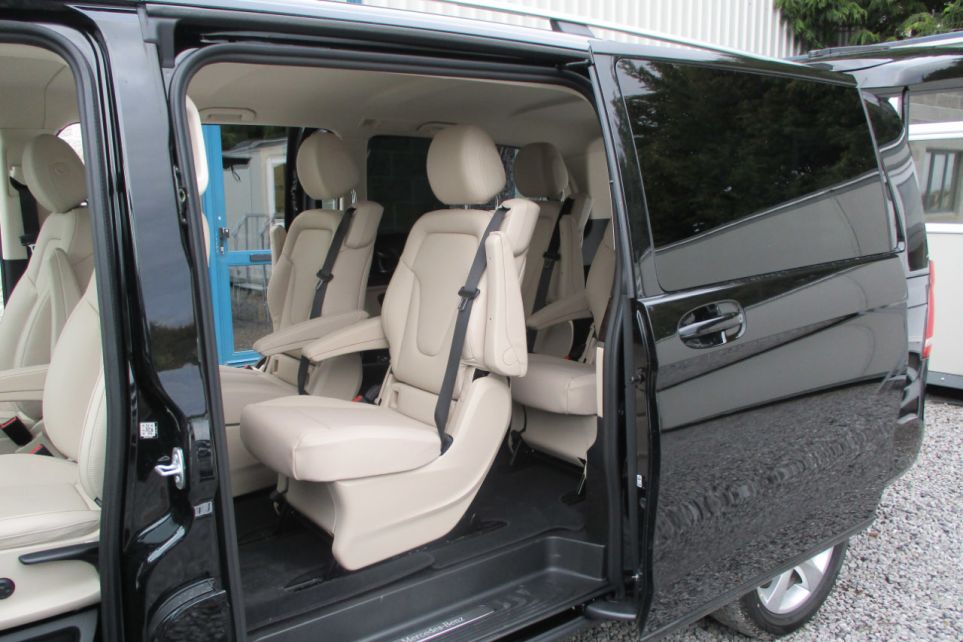 The interior of a black four seater Mercedes V Class luxury mini van for private tours of Ireland.
