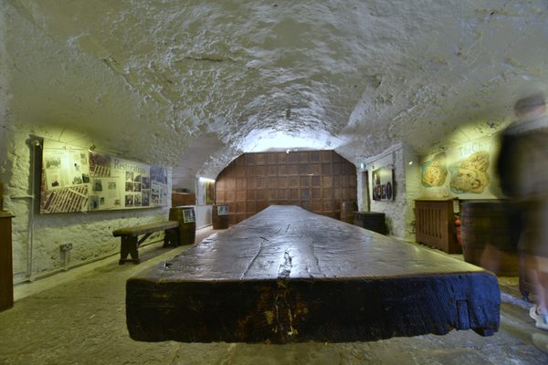 The massive single-plank timber table in the Cellar Room at Bunratty Castle