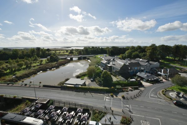 The view from the top of Bunratty Castle, looking down over the village towards the Shannon estuary