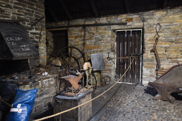 The interior of one of the old working buildings at Bunratty Folk Park, with its tools and tackle