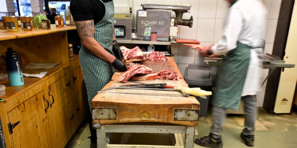 A butcher's counter displaying fresh meat at the English Market in Cork City