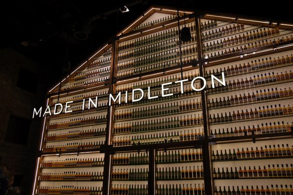 The 'Made in Midleton' wall of whiskeys at Midleton Distillery Experience