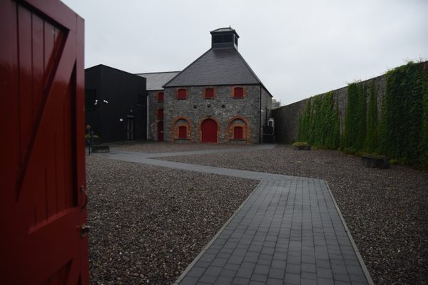The historic distillery buildings and courtyard at Jameson Midleton