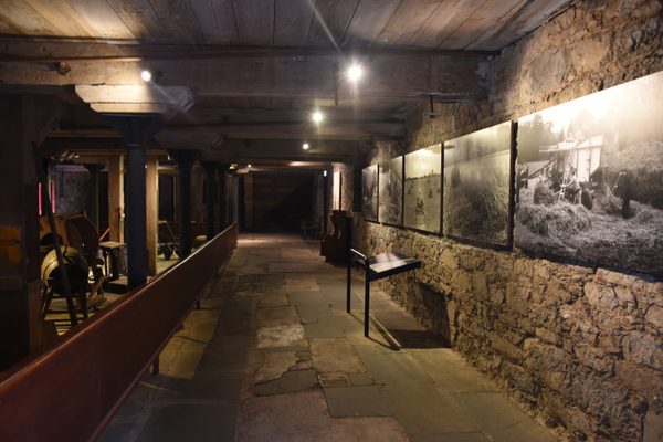 A corridor of historic photographs at Midleton Distillery Experience