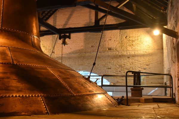 A close-up of the riveted copper of the great pot still at Midleton Distillery Experience