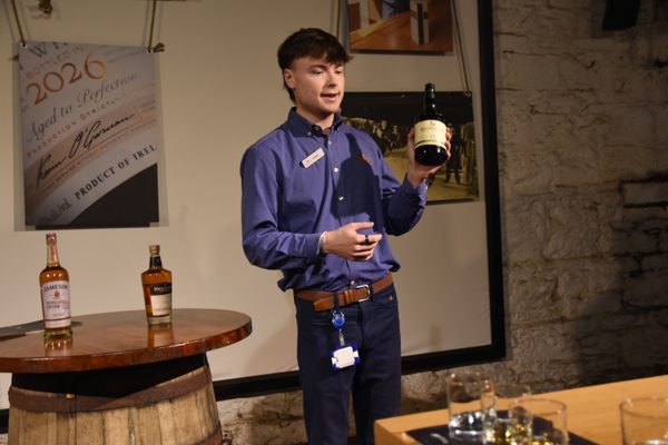 Holding a bottle of Midleton Very Rare during the tasting