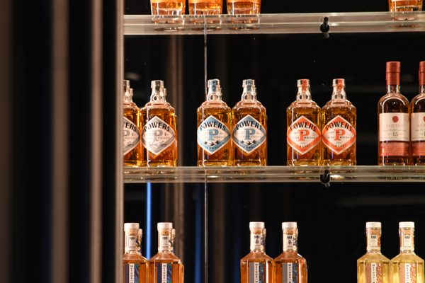 Shelves of Irish whiskey - Jameson, Powers and Redbreast - at Midleton