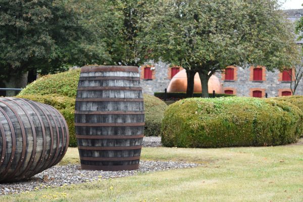 Barrels and copper vats in the courtyard of Midleton Distillery Experience