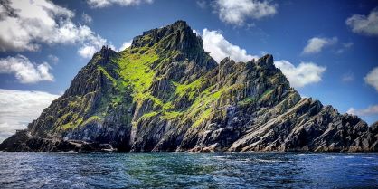 Skellig Michael Island off the Coast of Kerry on a blue sky day.
