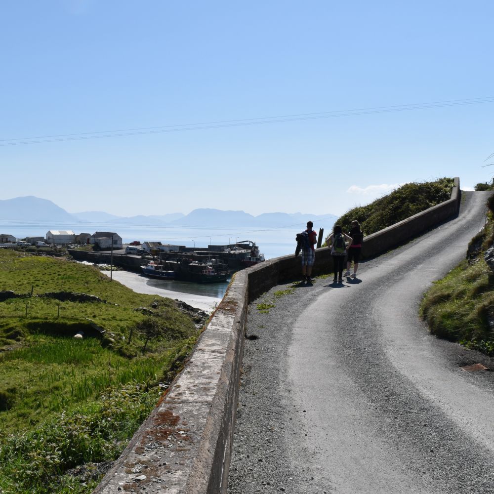 People walking a pathway along Inishturk Island, off the coast of County Mayo