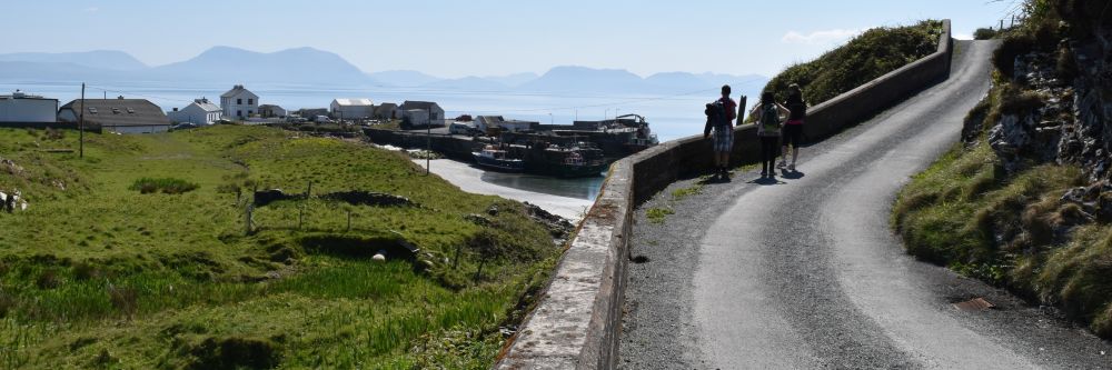 People walking a pathway along Inishturk Island, off the coast of County Mayo