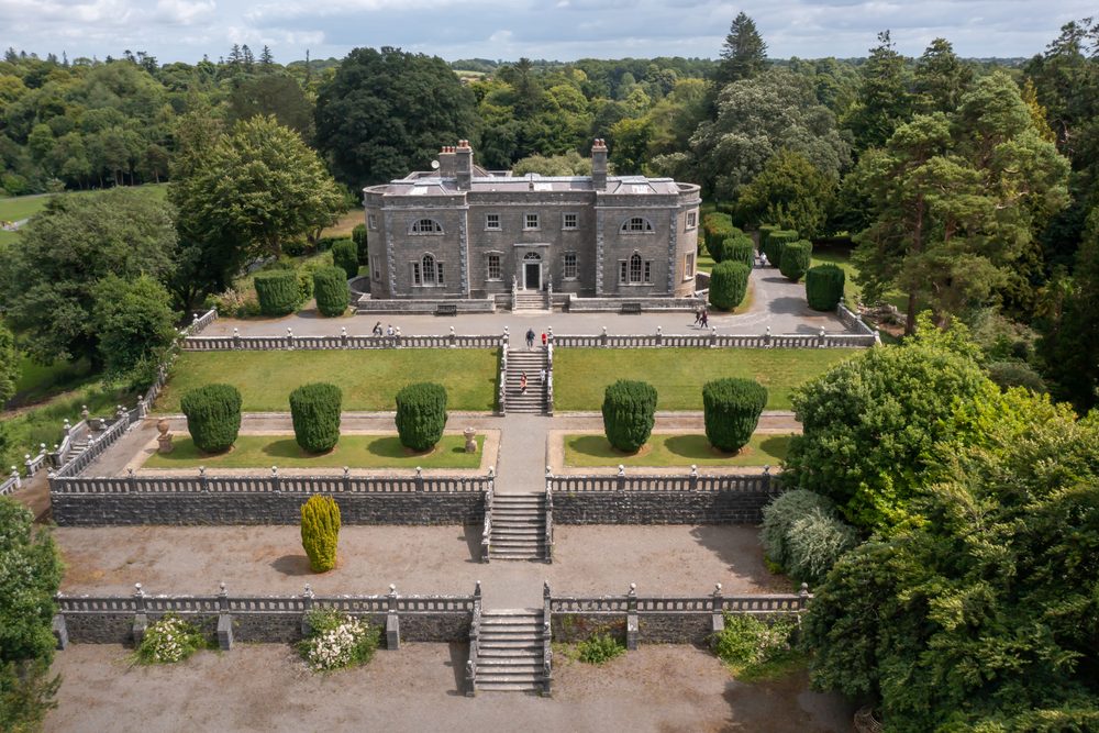 The Georgian facade of Belvedere House, County Westmeath, above its terraced gardens